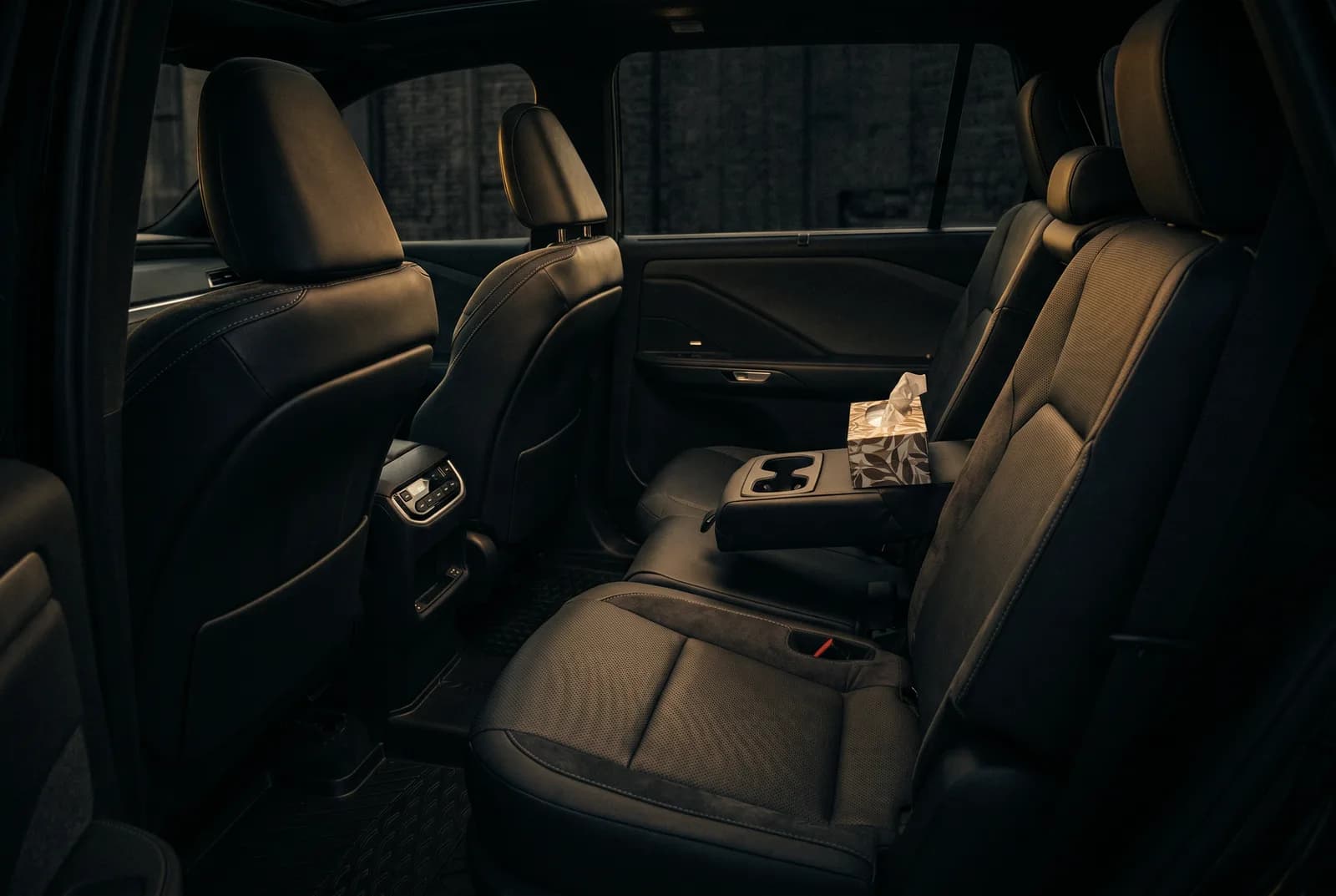 Interior of the Lexus TX with warm ambient lighting